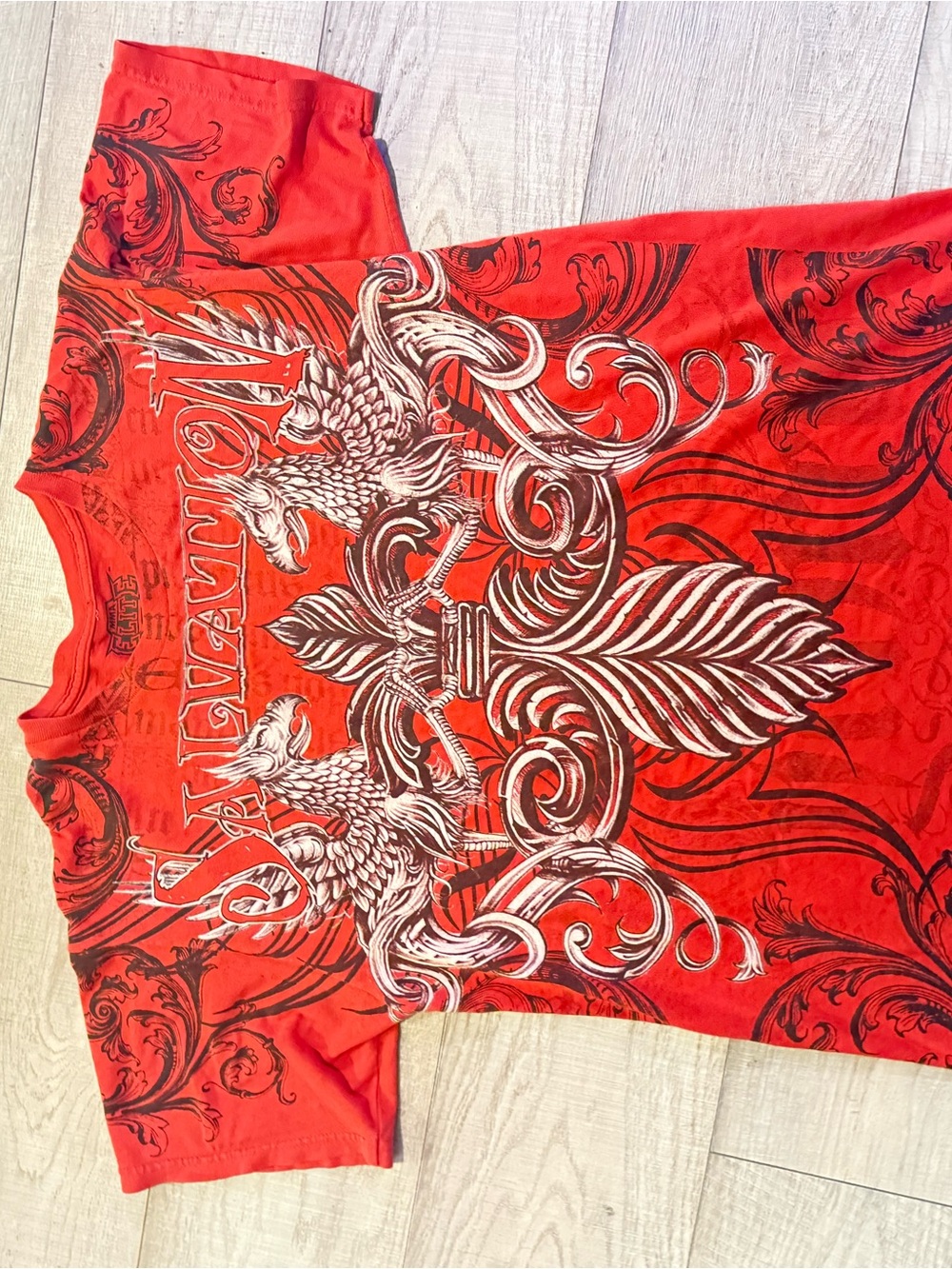 Red Graphic Short Sleeve Men's Tee with Ornate Crest Design